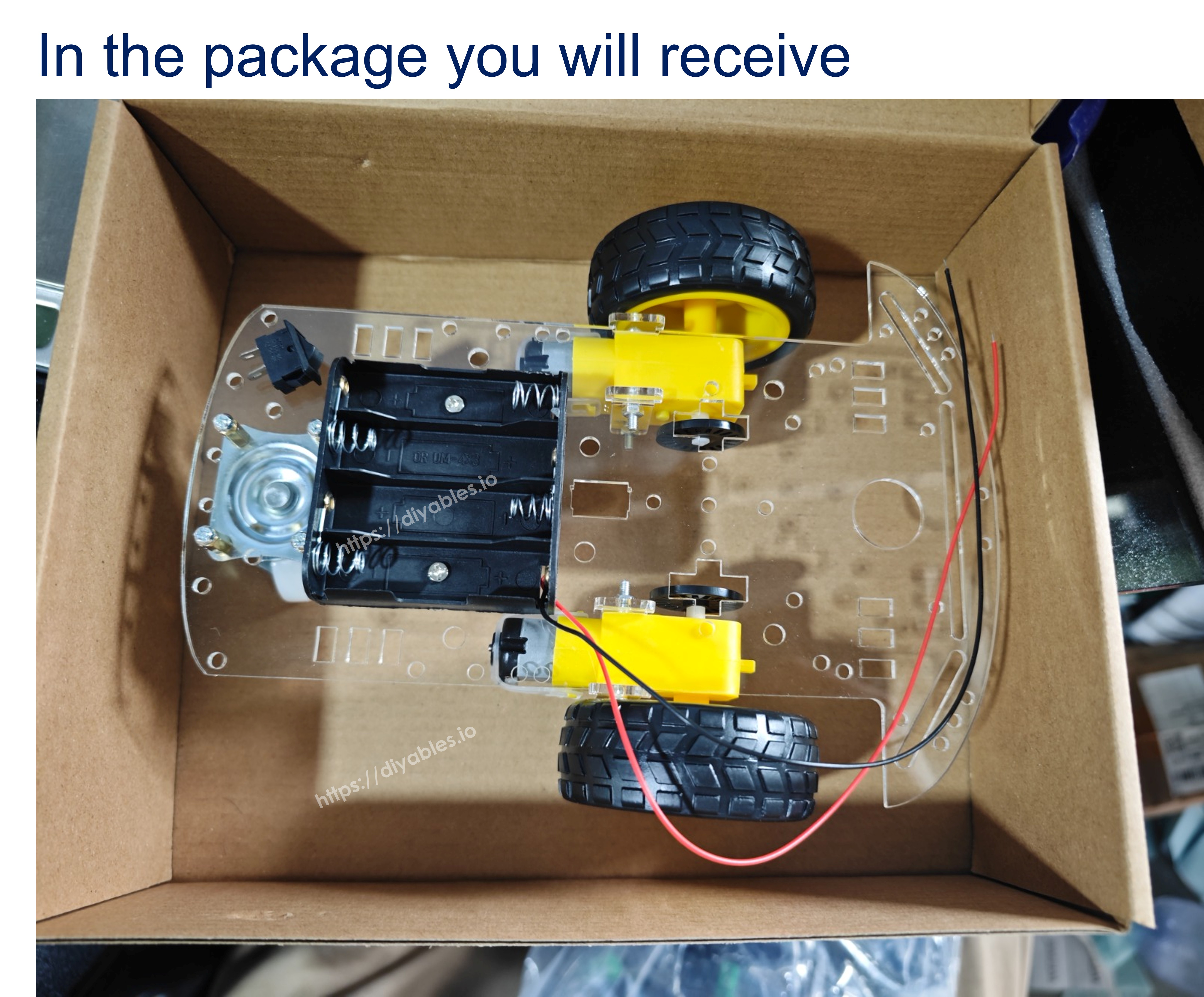 2WD robot car chassis kit packaging showing pre-assembled parts ready to use