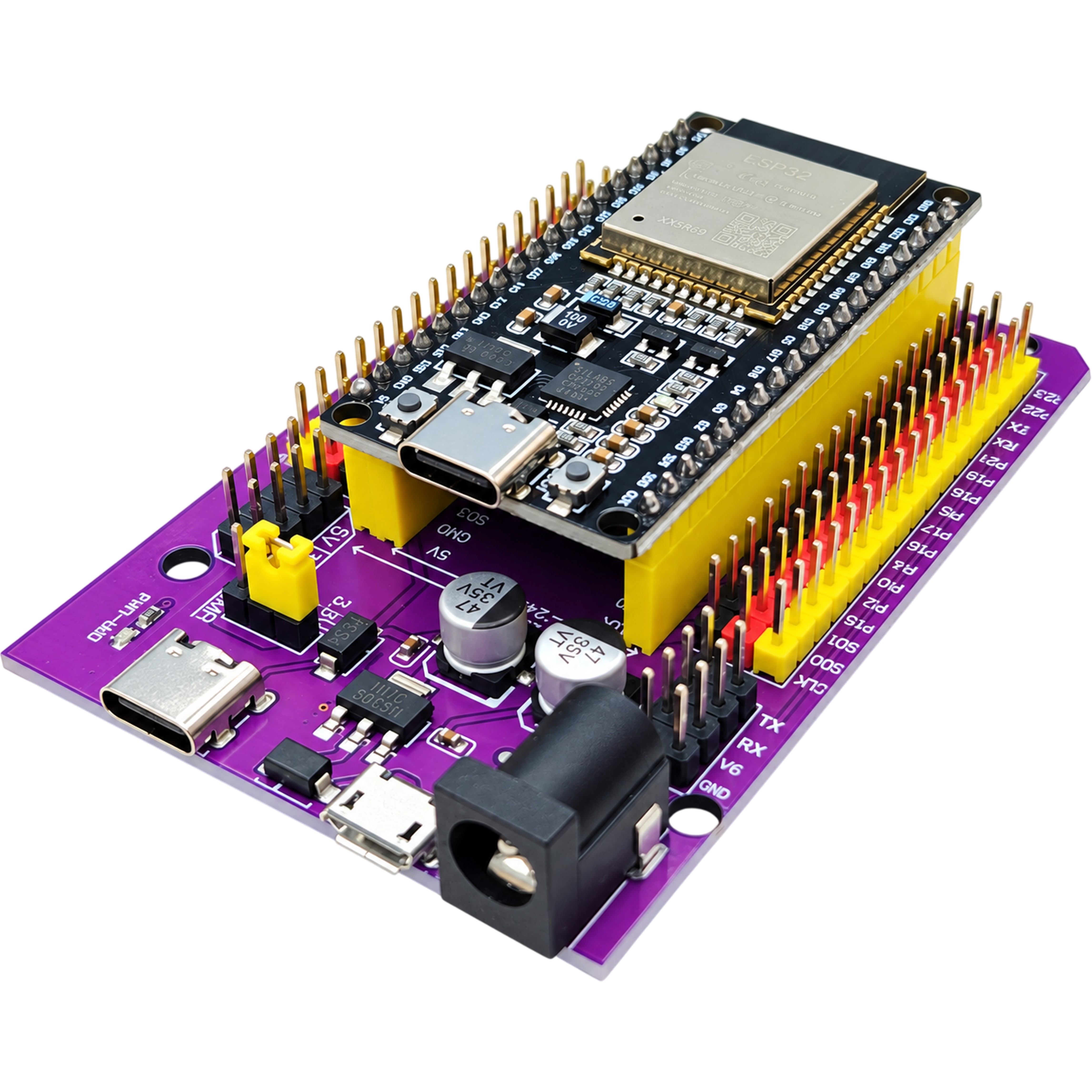 ESP32 board stacked on the expansion board with labeled TX RX VCC GND breakout pins